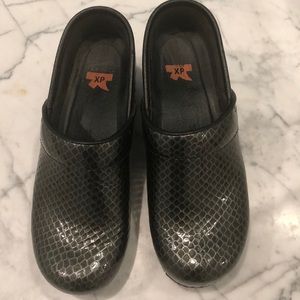 Dansko snake print clogs